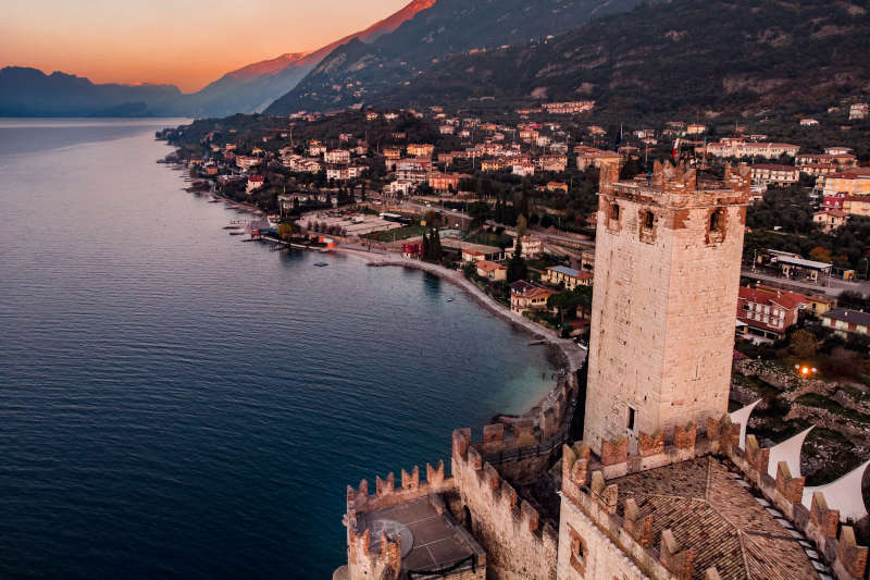 View on the town of Malcesine. Old castle on the rock